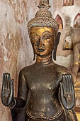 Vientiane, Laos - Wat Si Saket, The gallery around the sim houses thousands of Buddha statues in various mudras, dating  from the 16th century. 